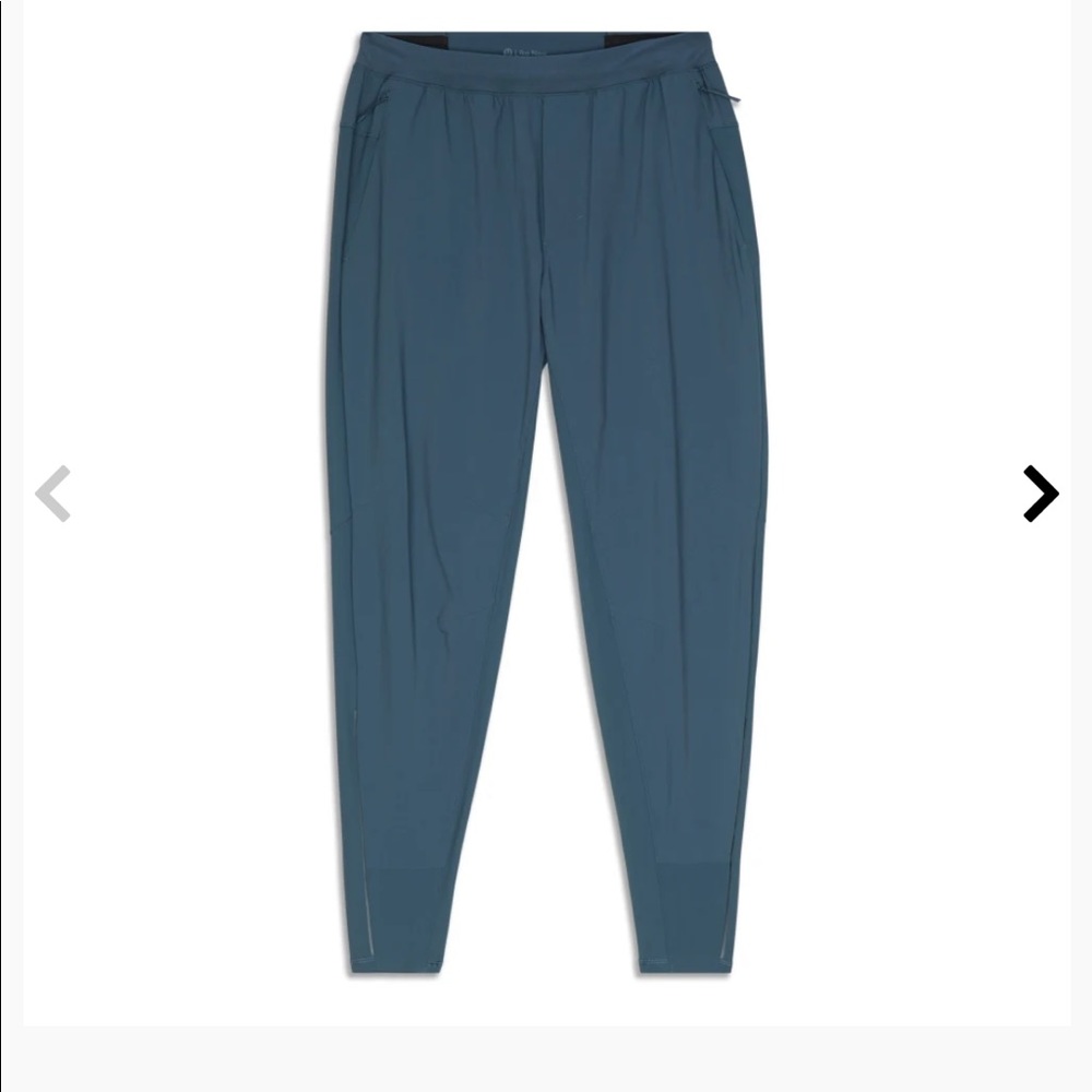 Never worn.  NWT mens large lululemon surge hybrid pant.